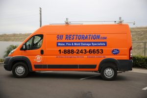 Water Damage Restoration Team On Route To A Job Site