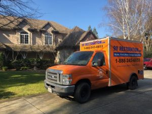 Water Damage Restoration Truck At A Job Site